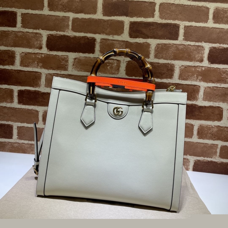G*u*i top handle bags
